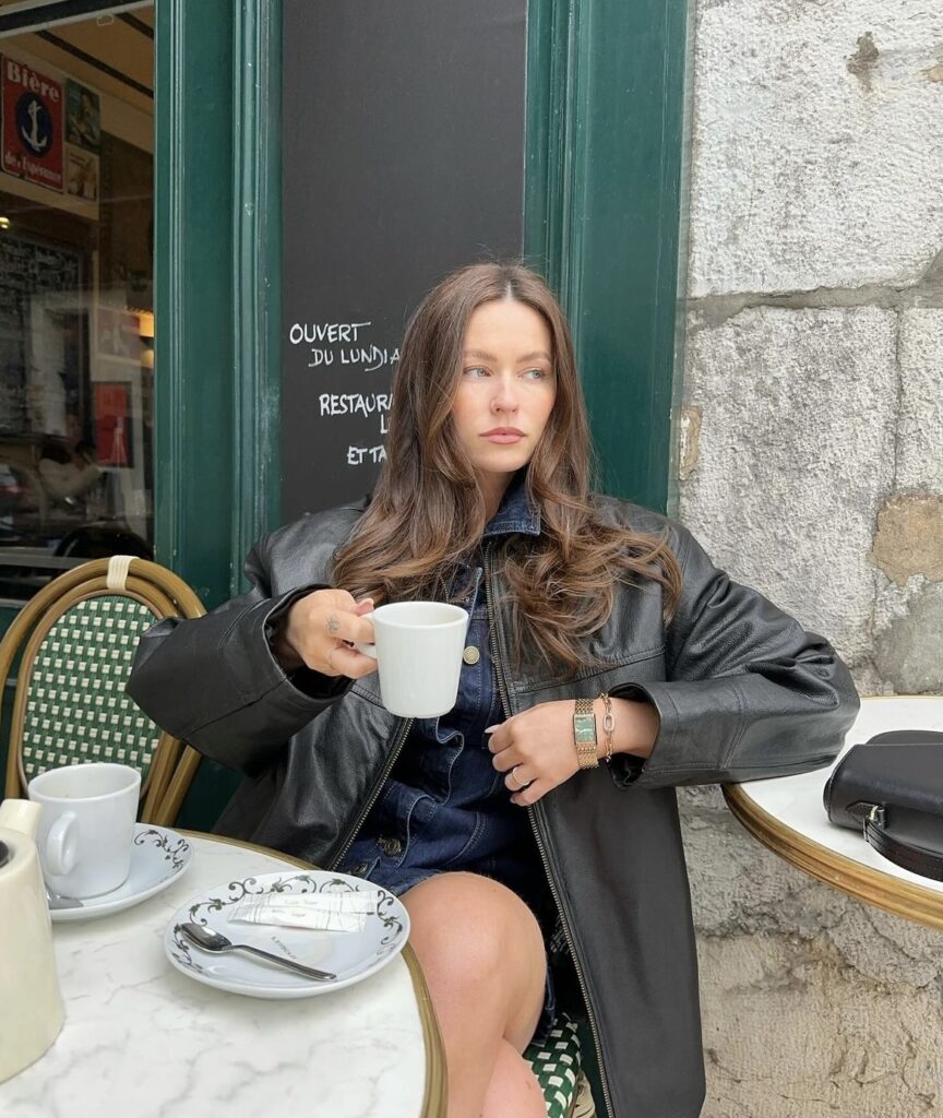 A stylish black leather jacket.